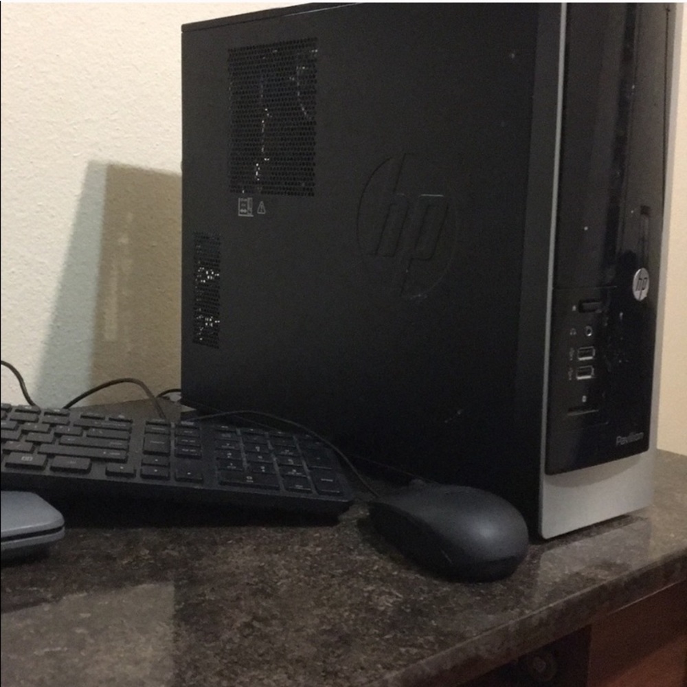 HP desktop with keyboard, mouse and monitor